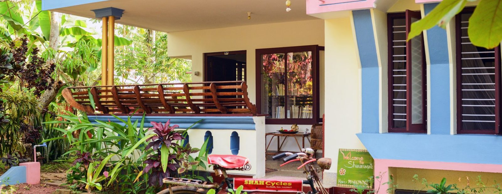 Front view of old style house, yoga books