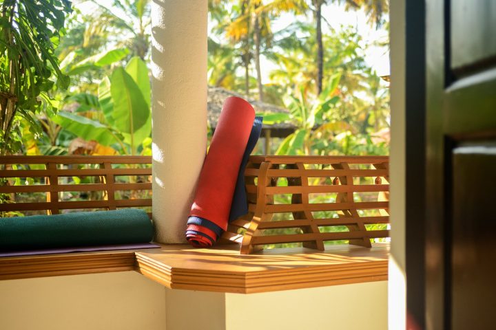 Yoga mats on balcony at yoga retreat house